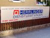 Auenschild von Herrlinger Dienstleistungen in Mnchen
